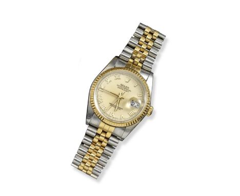 A gentleman's oyster perpetual Datejust gold and steel wristwatch by Rolex, automatic winding. The signed cream enamel dial w