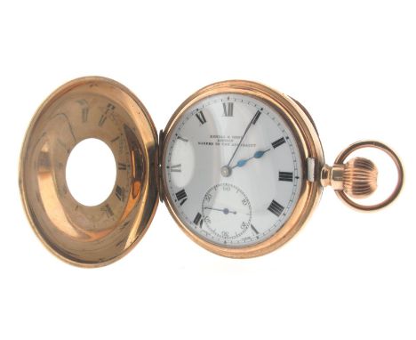 A 9ct gold half hunting cased stem-wind pocket watch, the white enamel dial with black Roman numerals and signed 'Kendal & De