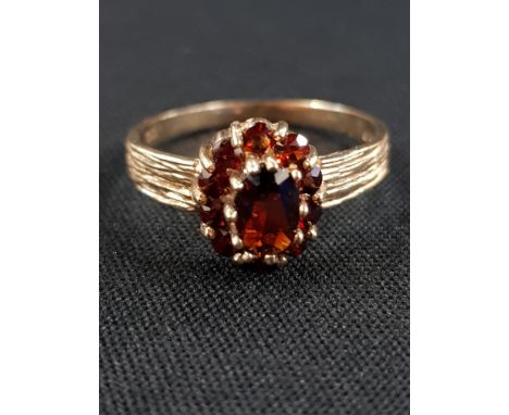 9 CARAT GOLD GARNET CLUSTER RING