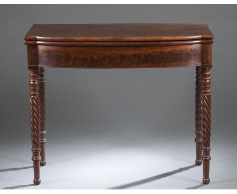 A Federal style mahogany card table. 19th century. Possibly Boston, Massachusetts. D-shaped flip-top with gate leg and rope t