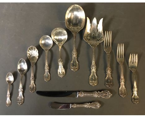 A Reed & Barton "Burgundy" pattern sterling silver flatware. Marked on bottom. ++ Twelve knives. 4 1/4". ++ Twelve knives. 9 