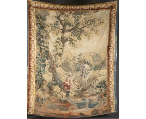 A French Abubusson style verdure tapestry. Circa 19th century. Wool on linen. Rosette border along three sides. Scene of man 