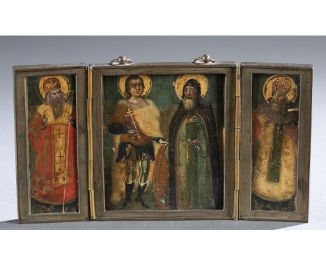 A Russian travel icon triptych of four saints. 19th century. Tempera on panel. Metal frame with enamel exterior. Closed: 3 1/