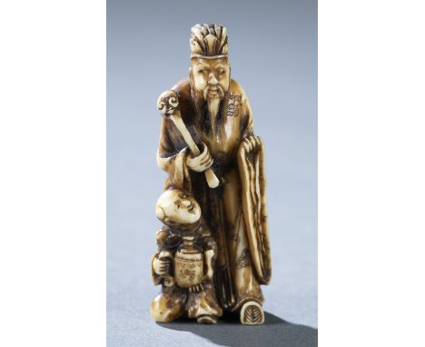 An ivory netsuke of a scholar holding a scepter with a karako by his side. Early 19th century. Signed Genryosai in reserve (M