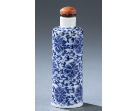 A Chinese porcelain snuff bottle. c.1800-1880. Underglaze blue over white ground with lotus scroll pattern. Four-character Ka