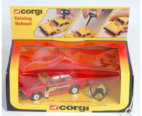 Corgi Toys, 273 Honda Ballade Driving School car, comprising red body, brown interior, with steering wheel attachment, in the