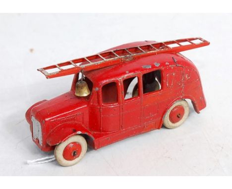 A Dinky Toys No. 25H pre-war streamlined fire engine comprising red body with red hubs and white tyres, and original bell, so