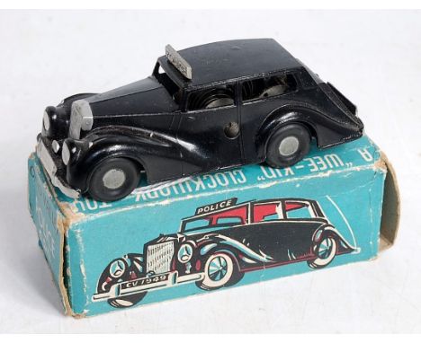 A Chad Valley No.222 Police car, comprising black body with Police roof sign and silver detail, in original all-card box (VG,