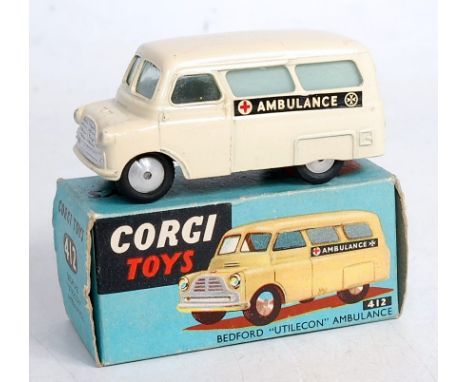 A Corgi Toys No.412 Bedford Utilecon Ambulance, comprising cream body with ambulance livery and spun hubs, in original blue a