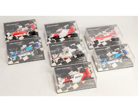 Seven various plastic cased Minichamps 1/43 scale Maclaren F1 racing diecasts to include a Maclaren Ford M26 1978, a Maclaren