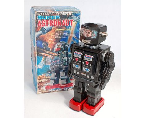 An SH Toys of Japan 1960s tinplate and battery operated Super Astronaut Rotatomatic Robot comprising of metallic grey body wi