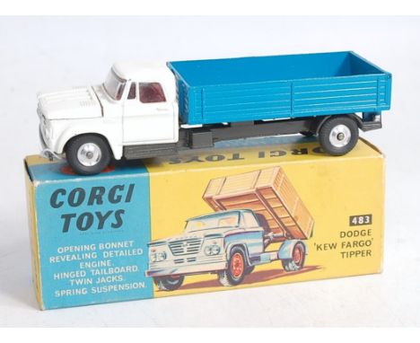 A Corgi Toys No.483 Dodge Kew Fargo tipper, comprising white body with red interior, blue back and metallic grey chassis, in 