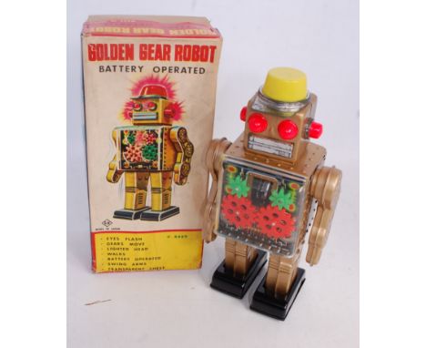 A Horikawa SH Toys of Japan, Golden Gear Robot, comprising of gold and black tin plated body with rear battery box, open fron