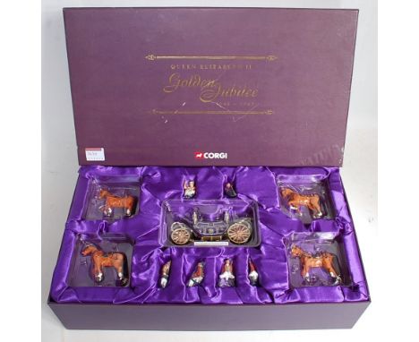 A Corgi Toys Modern Release Queen Elizabeth II Golden Jubilee box set in the original purple ground all-card box with velvet 