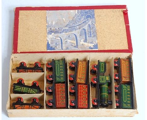 A Kellerman Toys of Germany circa 1910 early penny toy train set, the penny toy set comprises of a combined six wheel engine 