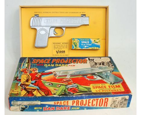 A Merit Dan Dare Space Projector gun, comprising silver gun with a boxed set of Dan Dare Space film strips, in the original p