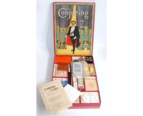 A Chad Valley circa 1930s Magician's Conjuring Up-to-Date Magic set, sold in the original all-card labelled box, with instruc