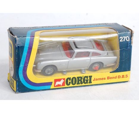 A Corgi Toys No. 270 James Bond Aston Martin DB5 comprising silver body with red interior and driver figure, missing bandit f