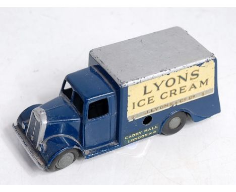 A Chad Valley No.502 Guy van, comprising dark blue and cream body, with tinplate rear doors and Lyons Ice Cream livery, loose