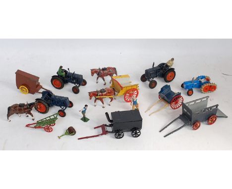 A collection of white metal and diecast Britains and other farming implements, to include Britains Fordson Major tractor with