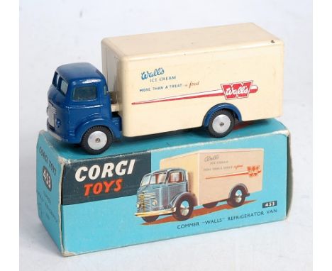 A Corgi Toys No.453 Commer Wall's refrigerator van, comprising dark blue cab and chassis, with cream back and spun hubs, in o