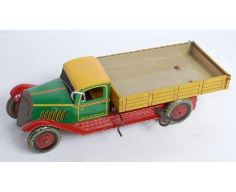 A 1930s Wells Brimtoy clockwork truck with tipper action
