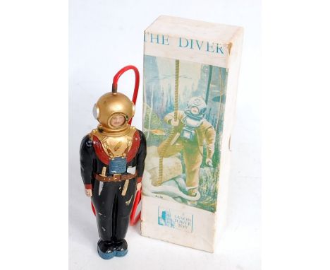 A Saxon Tower Toy Models of England, boxed, celluloid 'The Diver' toy, appears complete, in original pictorial box with leafl