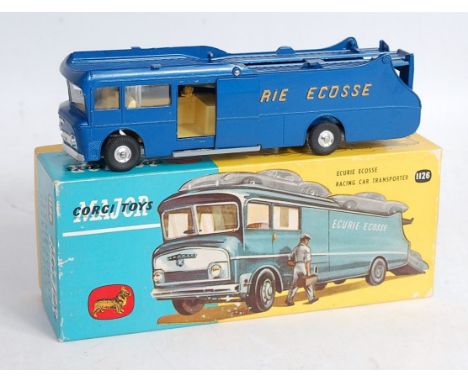 A Corgi Toys No.1126 Ecurie Ecosse racing car transporter, comprising metallic dark blue body with yellow lettering and spun 