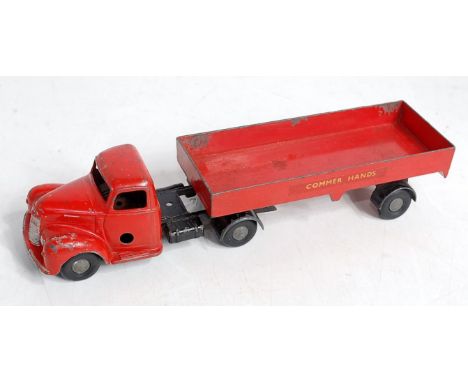 A Chad Valley Weekin Commer Hands articulated six-wheel delivery truck, comprising red and black body with red trailer, with 