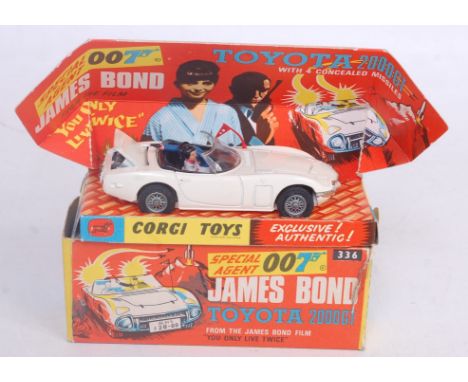 A Corgi Toys No. 336 James Bond Toyota 2000 GT comprising white body with wire work hubs, red flag, and two figures, sold in 