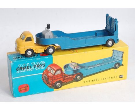 A Corgi Toys No.1100 Bedford Carrimore low loader, comprising yellow cab with metallic blue low loader trailer, smooth hubs a
