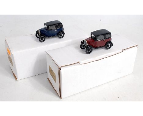 A white metal 1/43 scale Austin 7 saloon 1932 car group, two examples being No.MM1BL finished in black and blue, and No.MM1R 