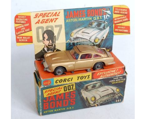 A Corgi Toys No.261 James Bond Aston Martin DB5, comprising gold body with red interior and bandit figure, sold in original s