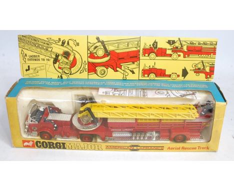 A Corgi Toys No. 1143 American La France Aerial Rescue truck comprising red chrome and yellow body with red diecast hubs, app