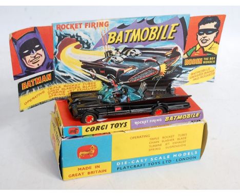 A Corgi Toys No.267 Batmobile, comprising gloss black body with Batman and Robin figures, Bat logos to doors and cast Bat log