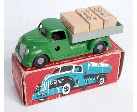 A Chad Valley No.225 open lorry, comprising green body with grey back and hubs, with three wooden crates, in the original all