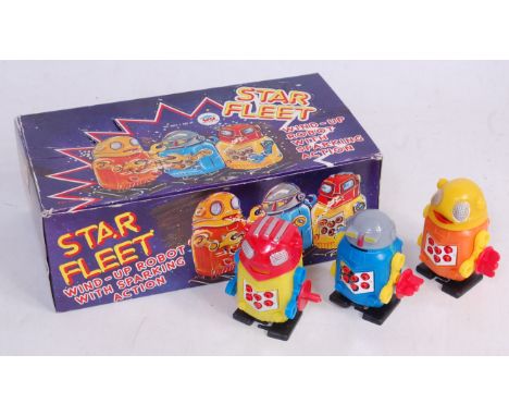 A Wonderful Toys of Hong Kong No. 521/A Star Fleet trade box of 12 wind-up robots with sparking action, 12 examples presented