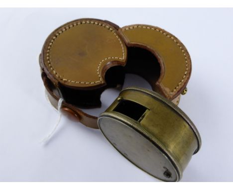 A Vintage Brass Military Gun Sight, in the original leather box.