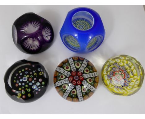 Five Glass Paperweights, including Whitefriars faceted paperweight carries a 'Monk Cane' dated 1982, nr 159/750, a faceted Jo