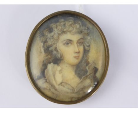 An oval portrait miniature depicting a young lady in Georgian costume, believed to have been painted on ivory.