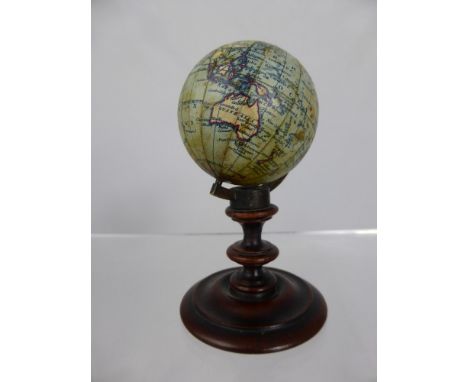 A J Wyld, Leicester Sq. Miniature Terrestial Globe, London 1851, J Addison Sc, the world supported by a brass arc on a turned