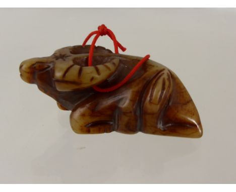 A Chinese Antique Jade Carved figure of a seated buffalo, .