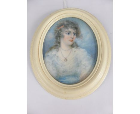 An Oval 19th Century Portrait Miniature, depicting a young lady, est 7 x 5.5 cms, presented in a ivory frame, entitled Mrs Ma