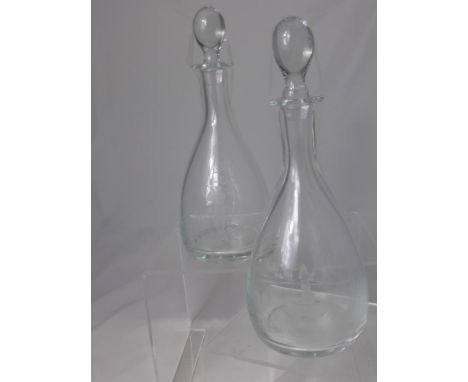 A Pair of Wine Decanters and Stoppers, each etched with Shooting and Fishing scenes, est 30 and 31 cms together with a pair o