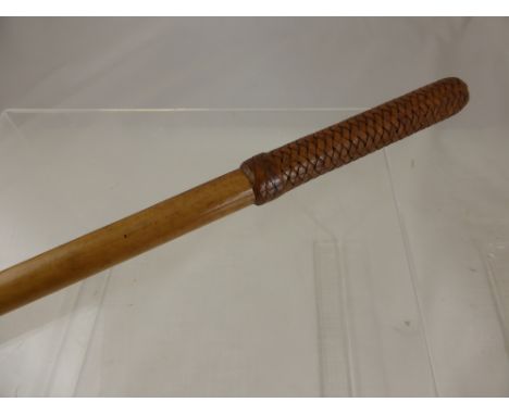 A weighted swagger stick.