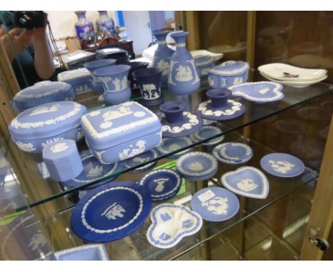 A Quantity of Wedgewood Jasperware, including lidded trinket dishes, three posy vases, two candle stick holders and commemora