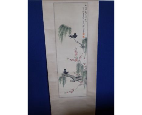 A Hand Painted Chinese Scroll Painting, depicting two black amongst cherry blossom, with character and date marks, supported 