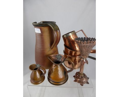 A collection of vintage pewter including five graduated tankards and a small jug together with a collection of assorted coppe