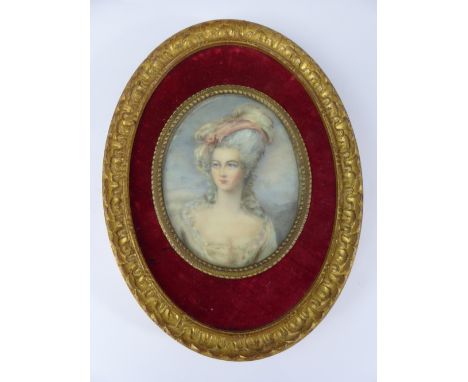 An Oval 19th Century Portrait Miniature of a Lady, the beautiful lady wearing 18th century costume, est 8 x 6.5 cms, in velve