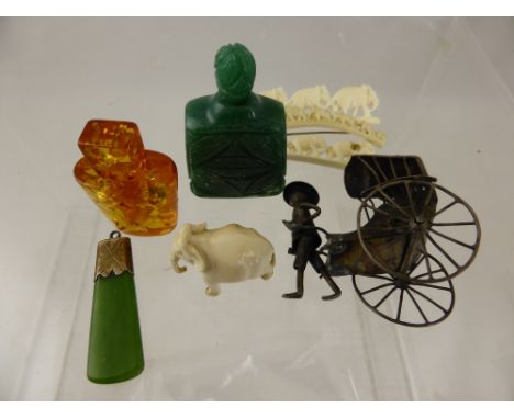 A Collection of Miscellaneous Items including green jade carved perfume bottle, antique green jade pendant, amber style perfu